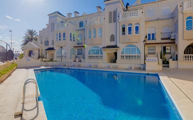 Недвижимость в Торревьеха. Район Los Frutales, 2 спальни, 77 м2